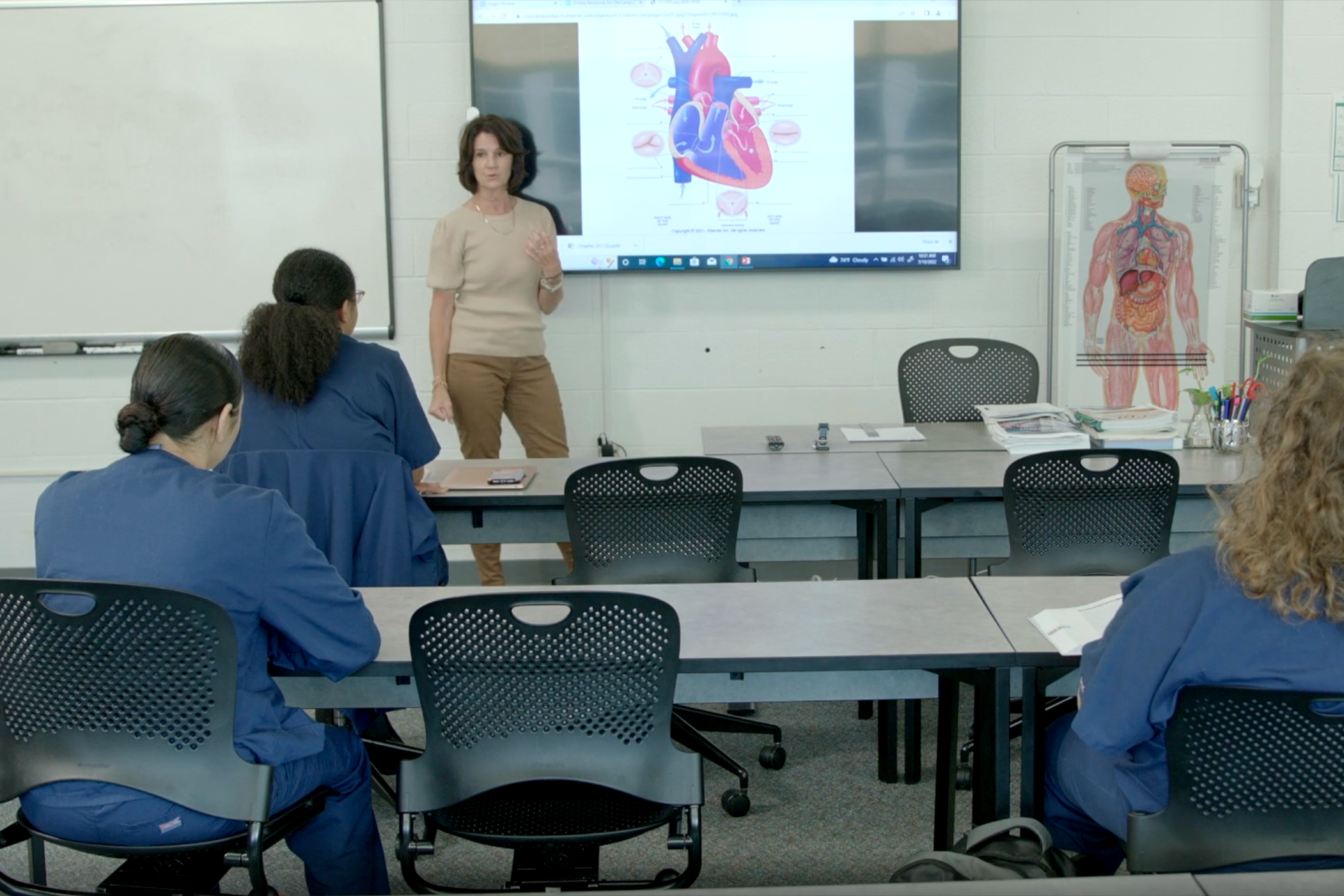 Healthcare students participating in a classroom lecture
